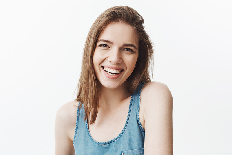 Young woman white teeth big smile