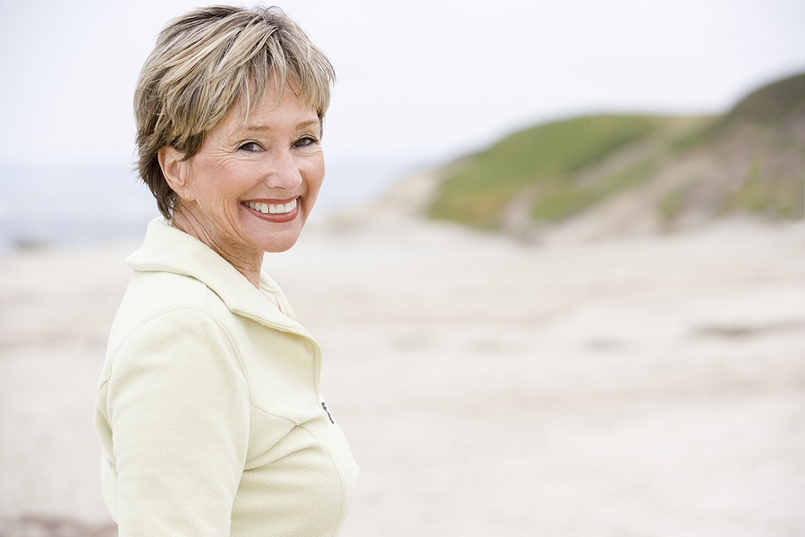 woman smiling on the beach