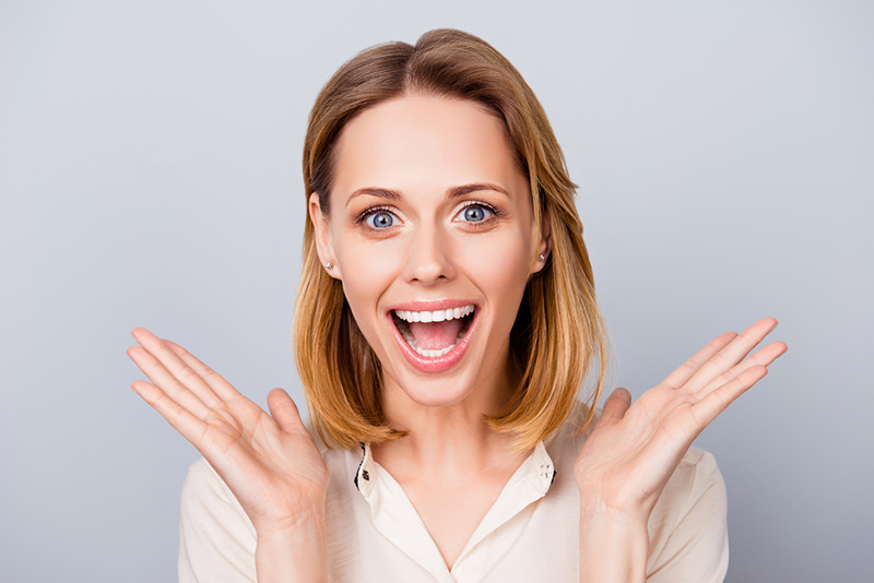 surprised woman with good teeth