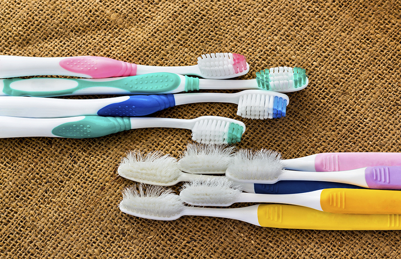 new and old toothbrushes vs tooth decay
