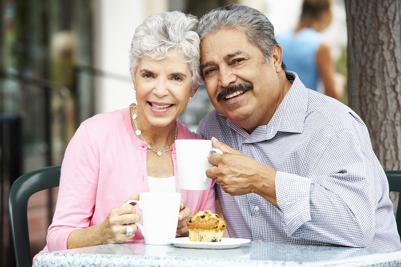 senior couple eating easily with dentures